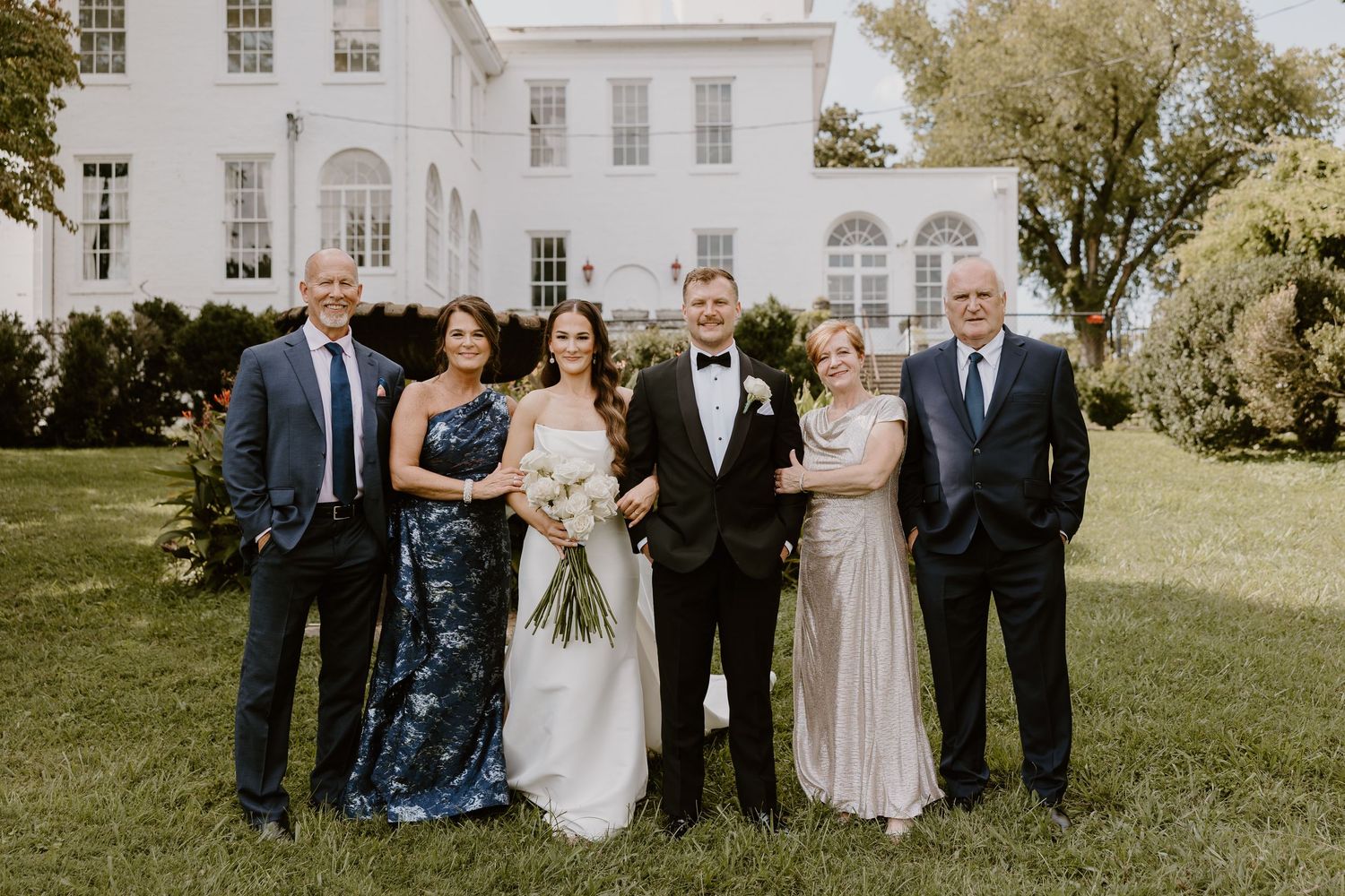 family portraits - Historic architecture and scenic river view at The Bleak House, Knoxville wedding photos