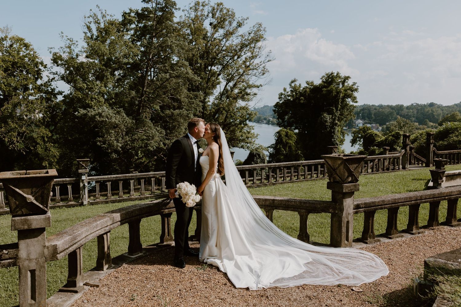 Groom smiling with bride at The Bleak House, Knoxville TN wedding photographer