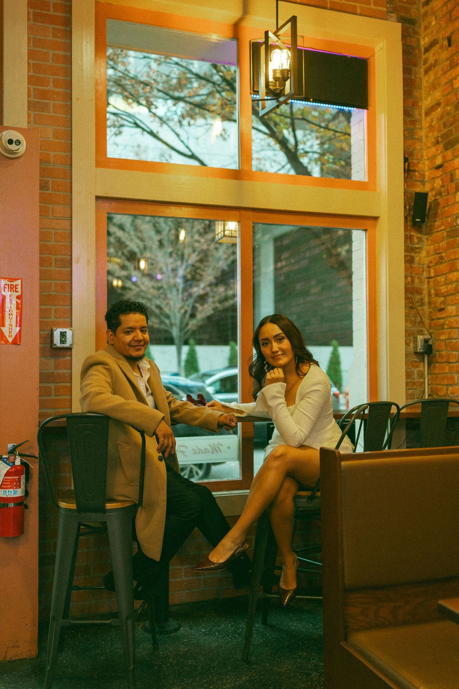 Nashville elopement photographer Karla Derry, couple sitting inside a restaurant