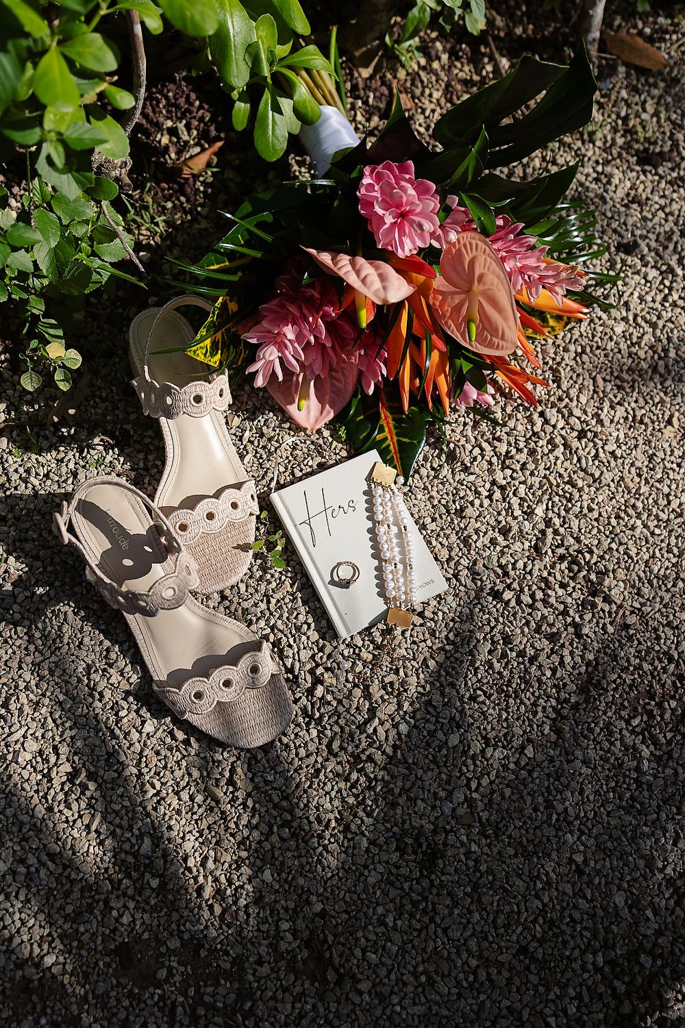 Bride details with tropical flowers and wedding stationery at Secrets Moxché destination wedding in Mexico.