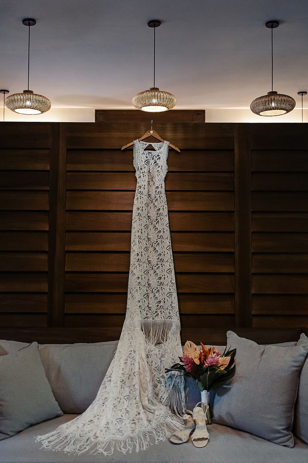 Wedding dress hanging in modern suite at Secrets Moxché Playa del Carmen.