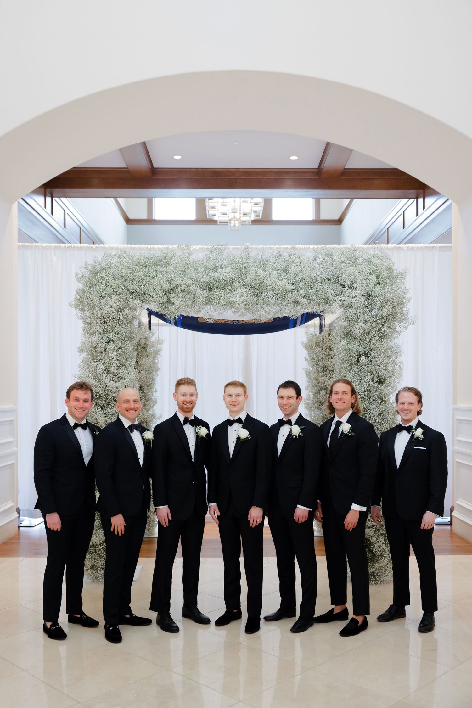 Grooms and groomsmen at BallenIsles Country Club in Palm Beach, Florida during a wedding photographed by Tom Forrest of Ohio.