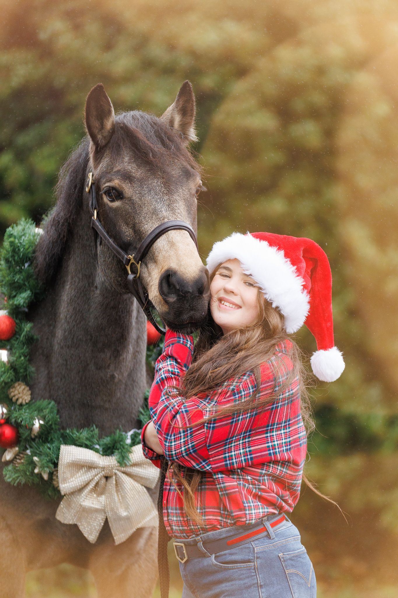 A series of photos showing a person in a white polka dot shirt with a black horse in a golden autumn field.
