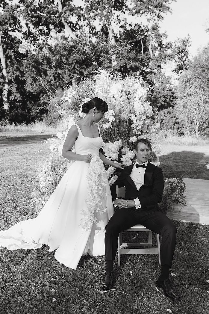 Bride and groom toasting with Plaisir Wine Estate wine.