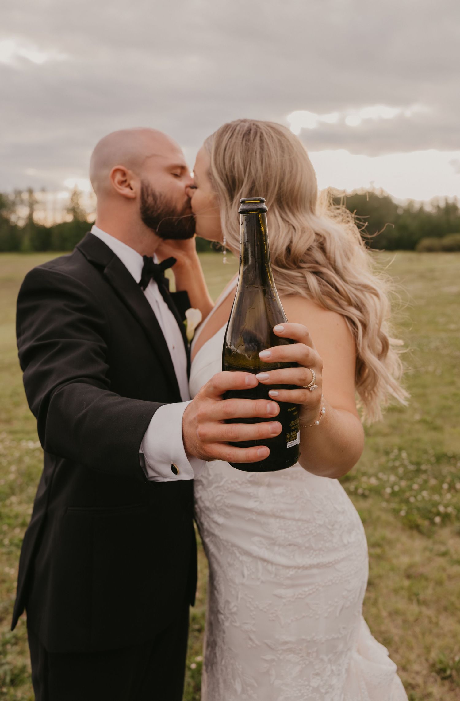 A romantic series of black and white wedding photos showing tender moments between newlyweds in formal attire.