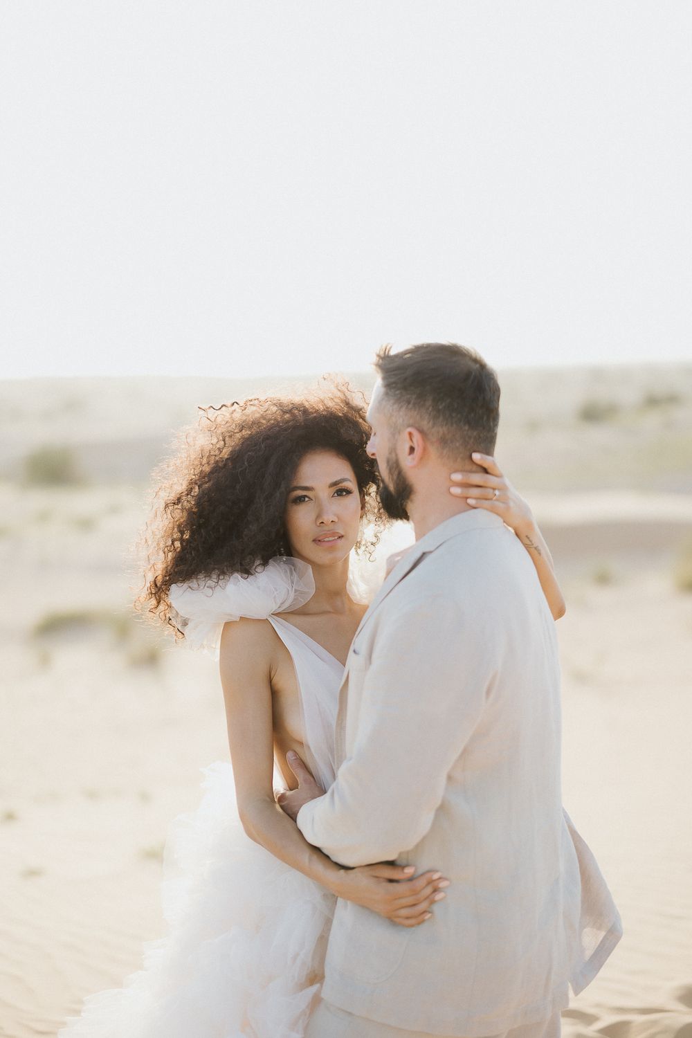 Elegant destination wedding portrait of bride and groom