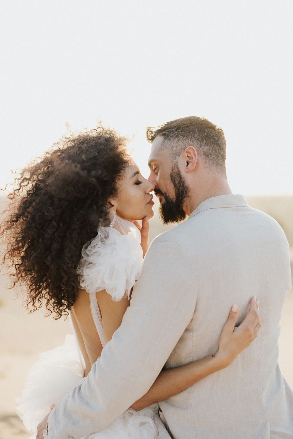 Romantic moment between bride and groom during a destination wedding