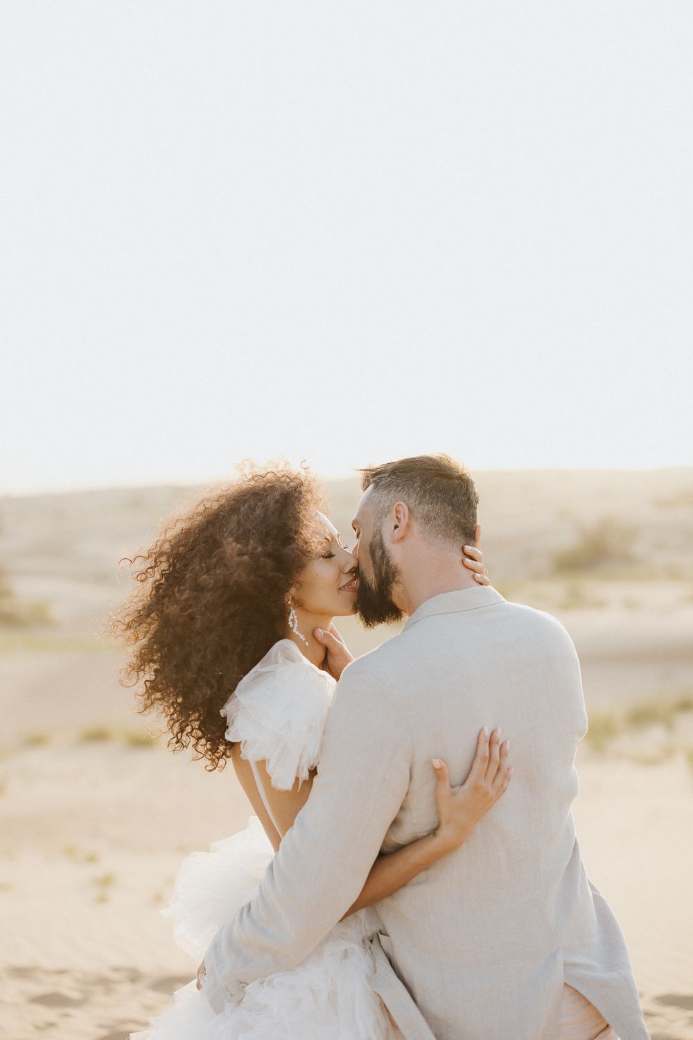 Romantic moment between bride and groom during a destination wedding