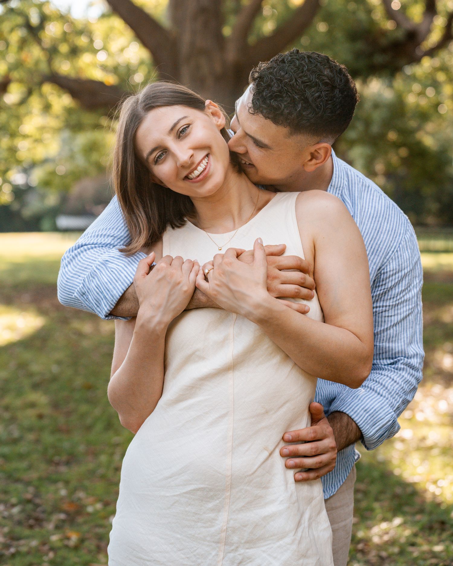 man-hugs-women-during-their-proposal-photoshoot-in-sydney-inner-west