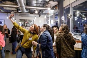 CEO Society women's networking event in Mercer Island, WA group of women taking selfie photo for instagram content connection, laughing fun
