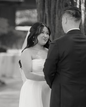 A panoramic black and white wedding photoshoot sequence showing the couple in formal attire outdoors.