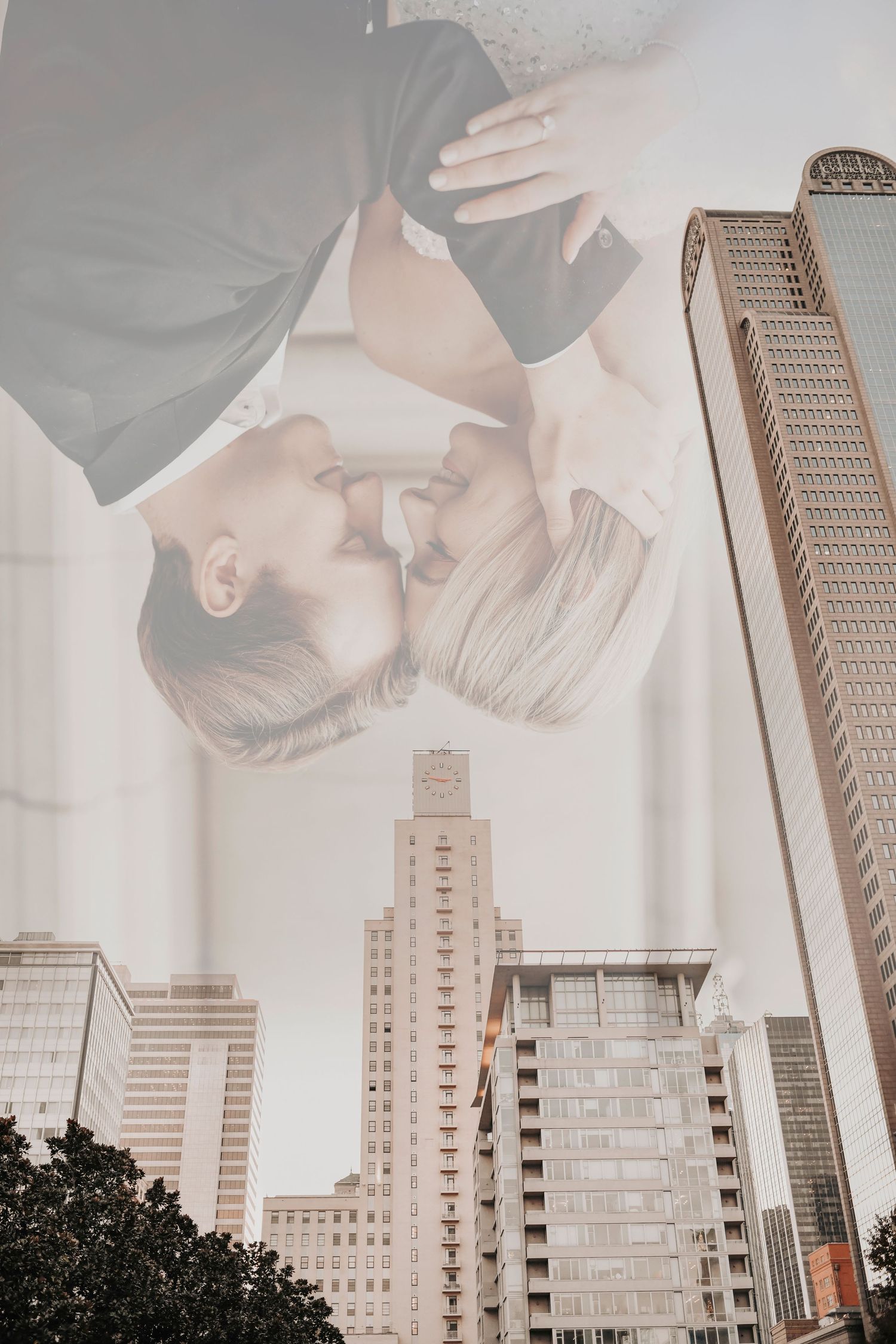 Modern romantic engagement photography in downtown Dallas with city backdrop