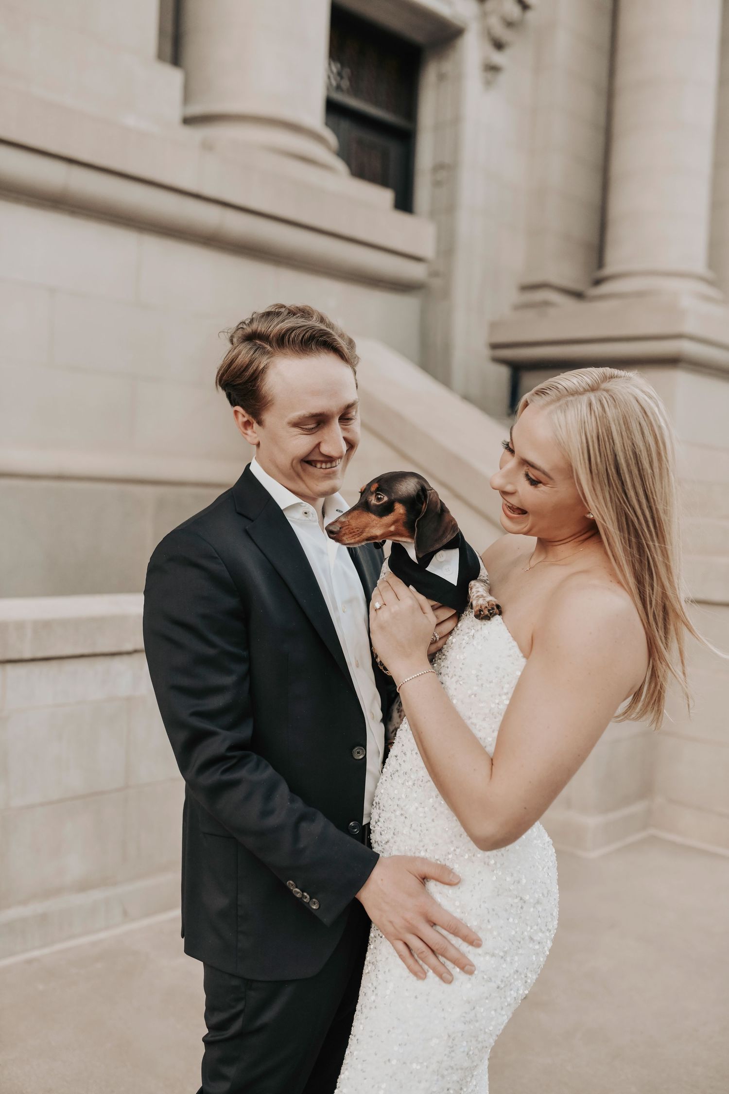 Urban engagement session in downtown Dallas with couple and pet