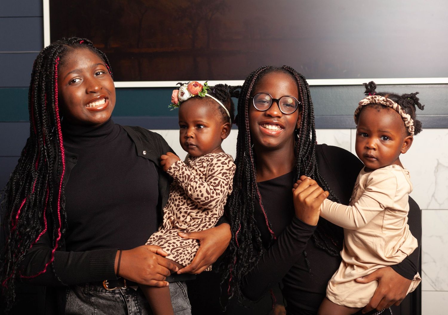 A series of seven candid photos showing joyful family moments and warm embraces against dark backgrounds.