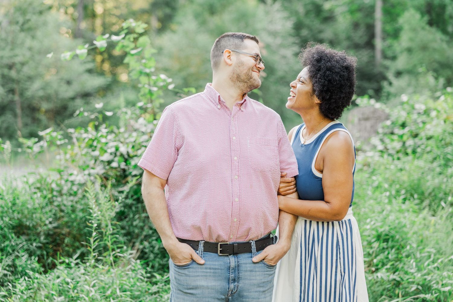 Natural candid moments captured during summer forest photoshoot.