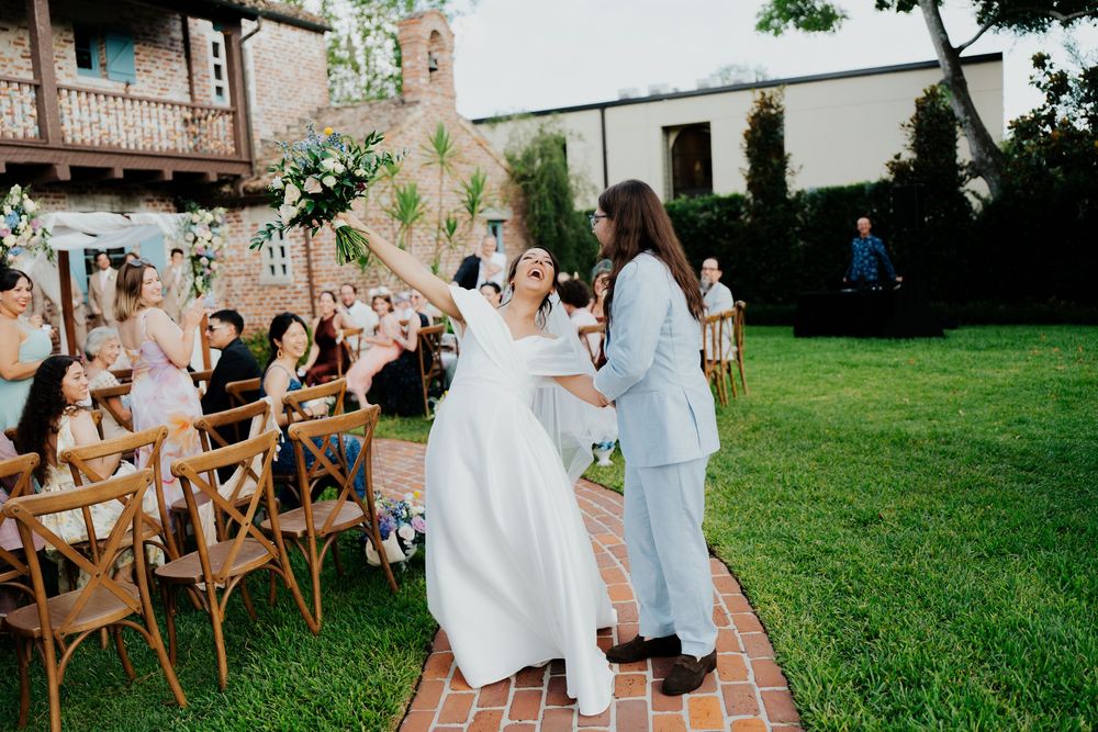 Bride walks down the isle at the Casa Feliz venue in Winter Park