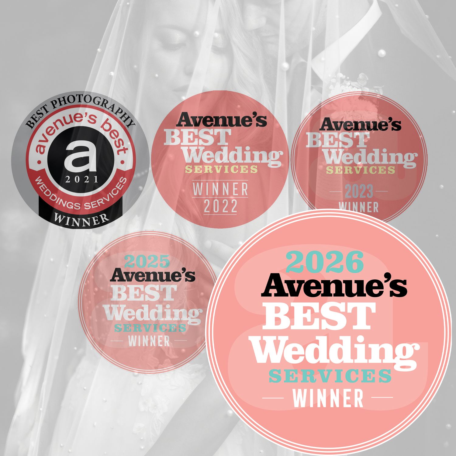 A collection of red and pink circular award badges and emblems for wedding photography arranged in a row.