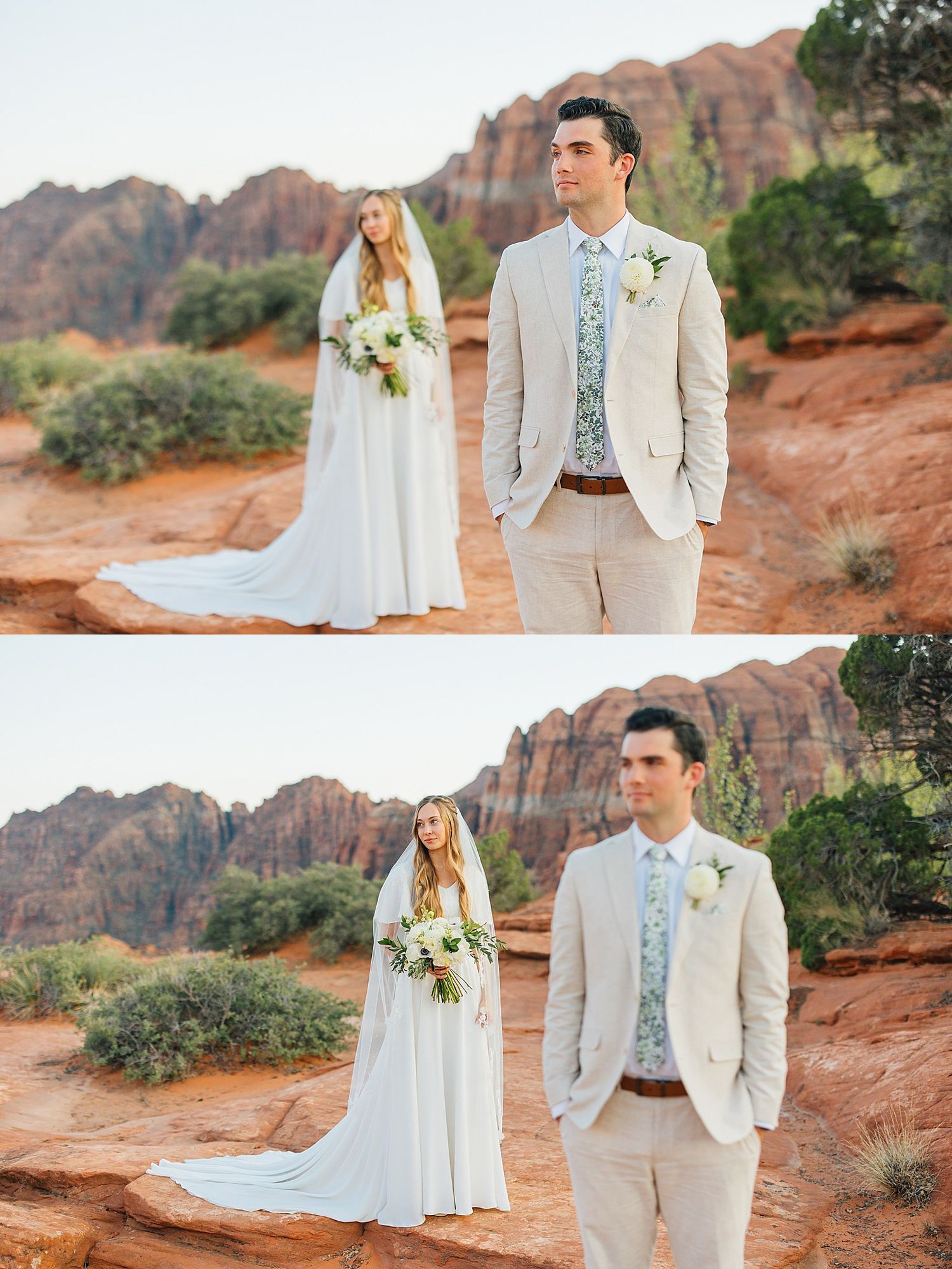 A couple in white wedding attire poses against stunning red rock formations in a desert landscape.