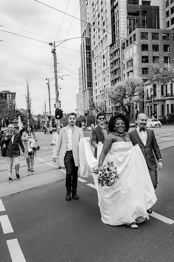 Series of black and white photos showing a wedding party walking down a city street.