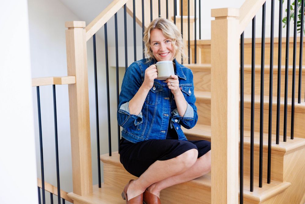 A collage of someone sitting on stairs while drinking coffee and wearing a denim jacket.