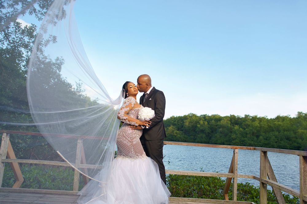 A series of wedding photos showing a couple celebrating their special day outdoors near a waterfront setting.