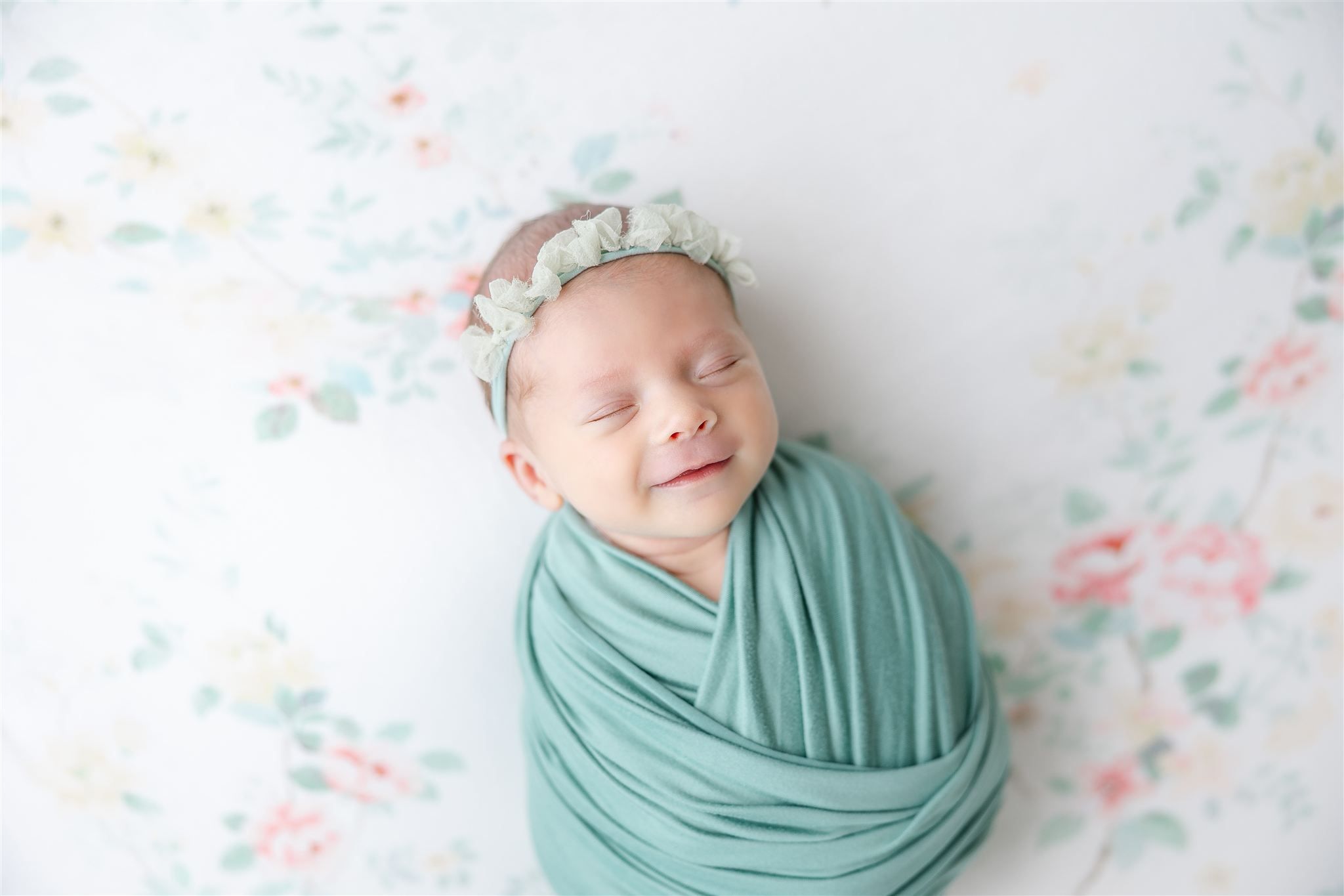 baby in green with floral