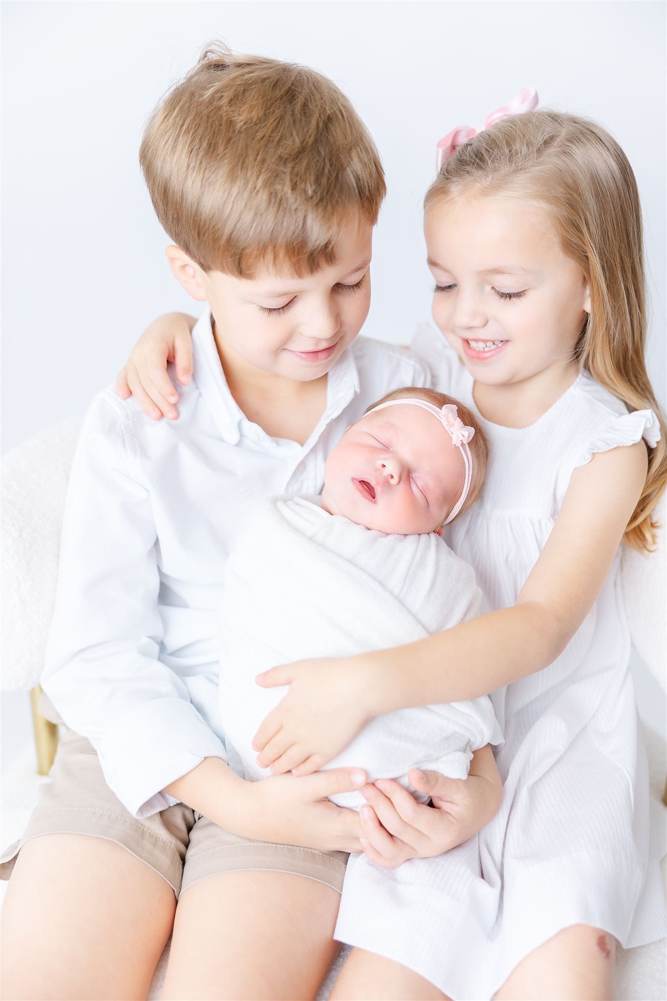 baby and siblings