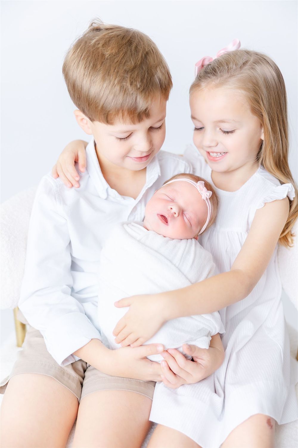 baby and siblings