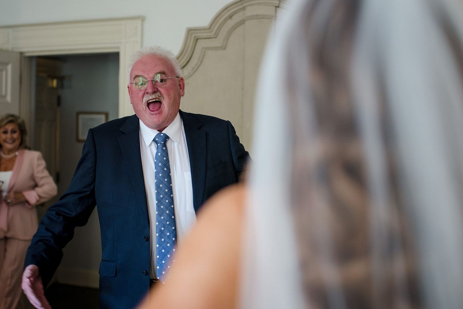 Father of the bride in a navy suit and sees his daughter the bride for the first time at The Westin Nova Scotian, Halifax, Nova Scotia