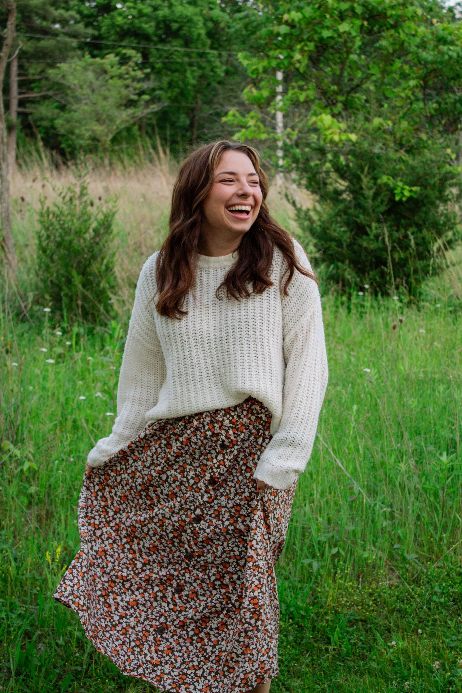 a girl smiling in the wind
