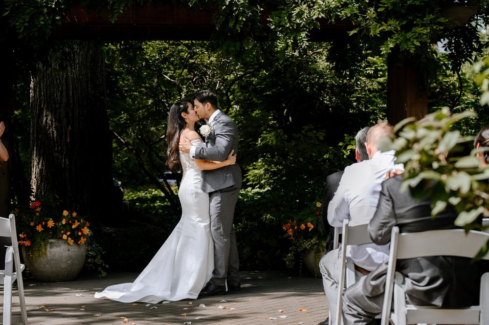 A collage of wedding photos showing couples dancing and embracing at an outdoor garden reception venue.