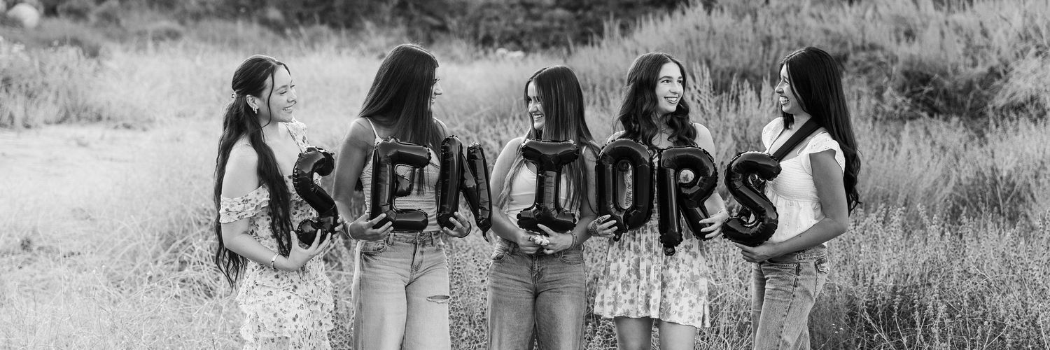A local Simi Valley Senior Rep Team getting their photos taken with a professional photographer.