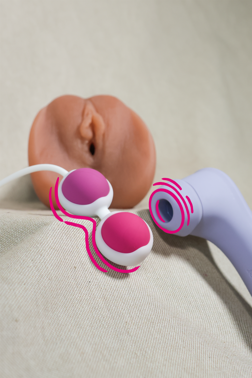 Close-up sequence showing a pink and white toy or device being assembled on a light gray surface.