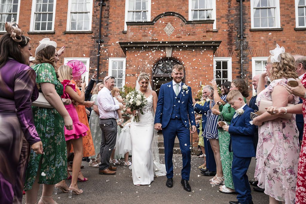 Kelham House wedding day confetti for the bride and groom outside the house