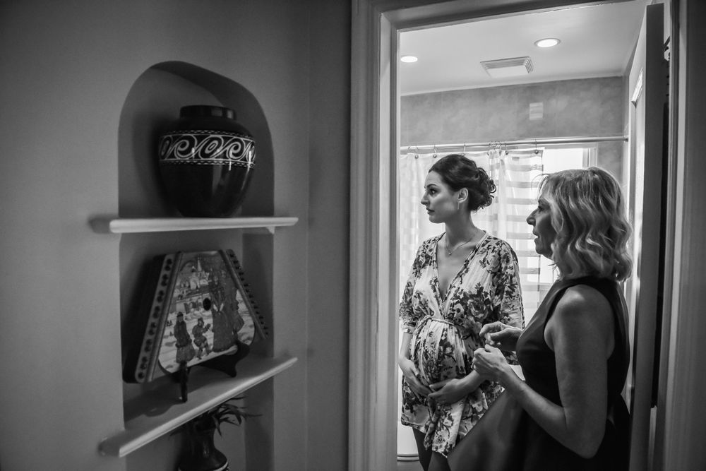 Five consecutive grayscale images show people browsing through items on store shelves.