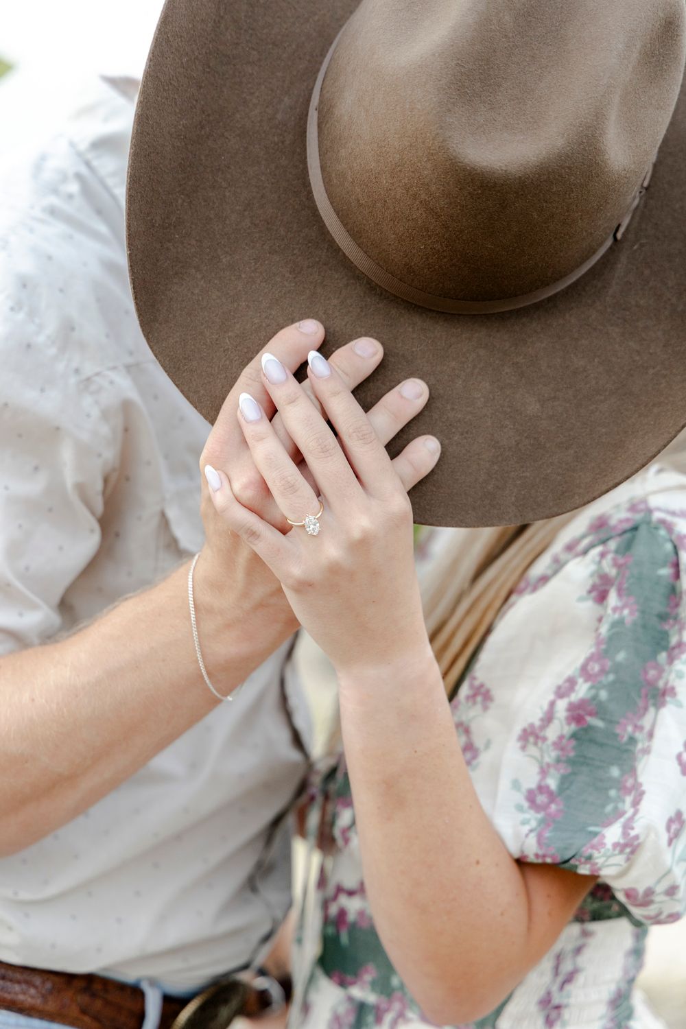 Engagement ring on bride-to-be’s hand after proposal in Dripping Springs Texas Hill Country.