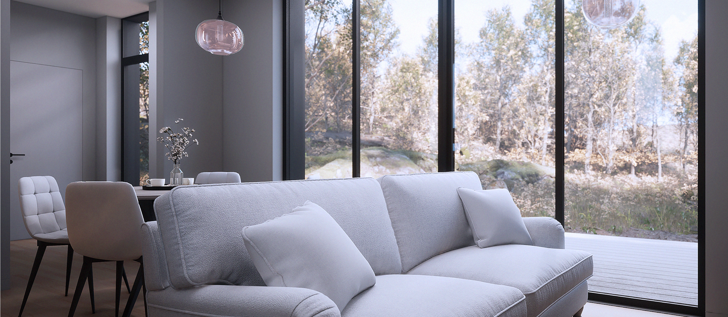 Modern bedroom interior with floor-to-ceiling windows, gray bedding, and natural lighting showcases scenic forest views.