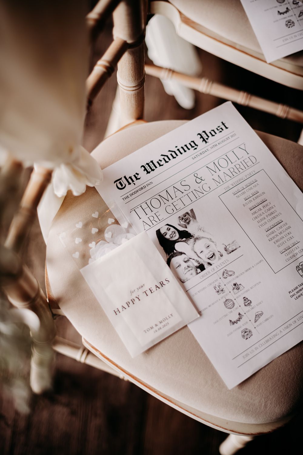 Elegant sepia-toned wedding invitation suite featuring delicate typography and romantic design elements on cream paper.