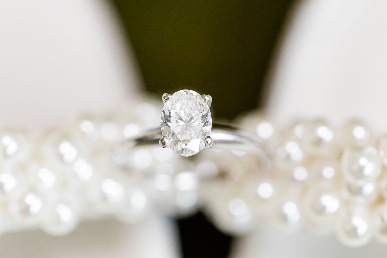 Sparkling crystal beads and jewelry details in soft focus.
