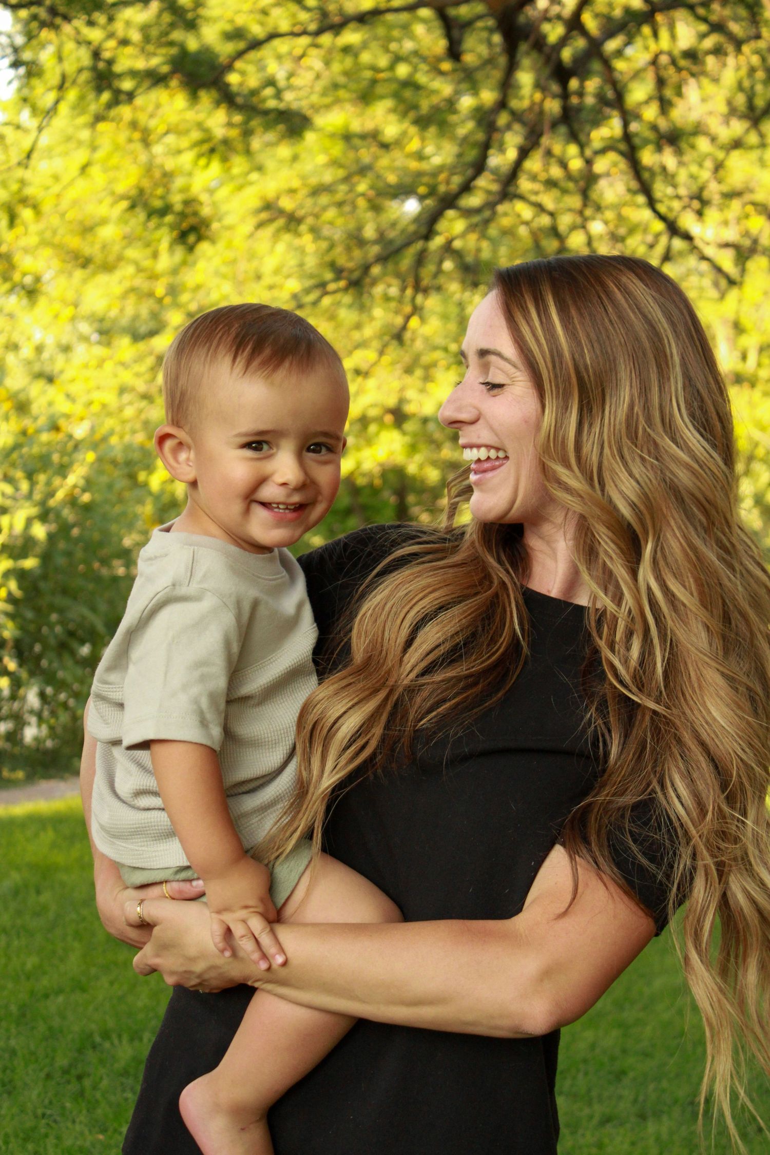 Candid loving interactions captured in a series of outdoor photos with sunny natural lighting.