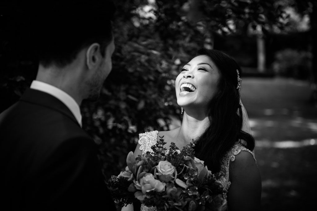 A black and white sequence captures an intimate wedding dance under natural light.