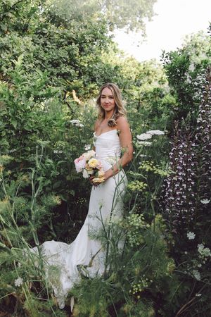 Bride and groom portraits at La Cotte in Franschhoek in the gardens