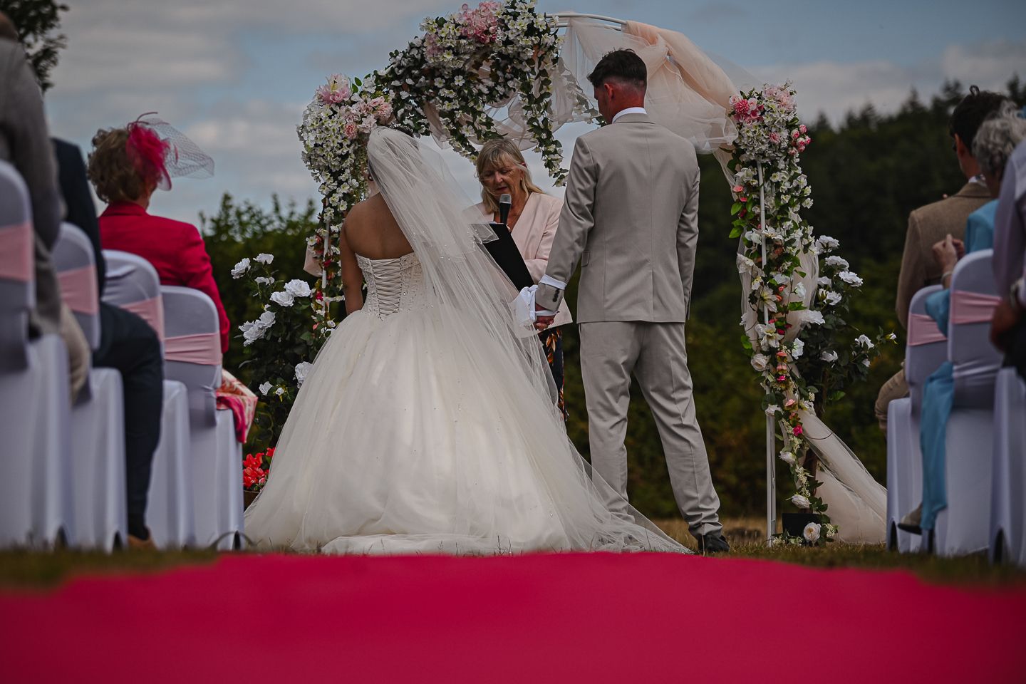 Dorset Wedding photographer, Kris the photographer, capturing a couple during their ceremony in Dorset
