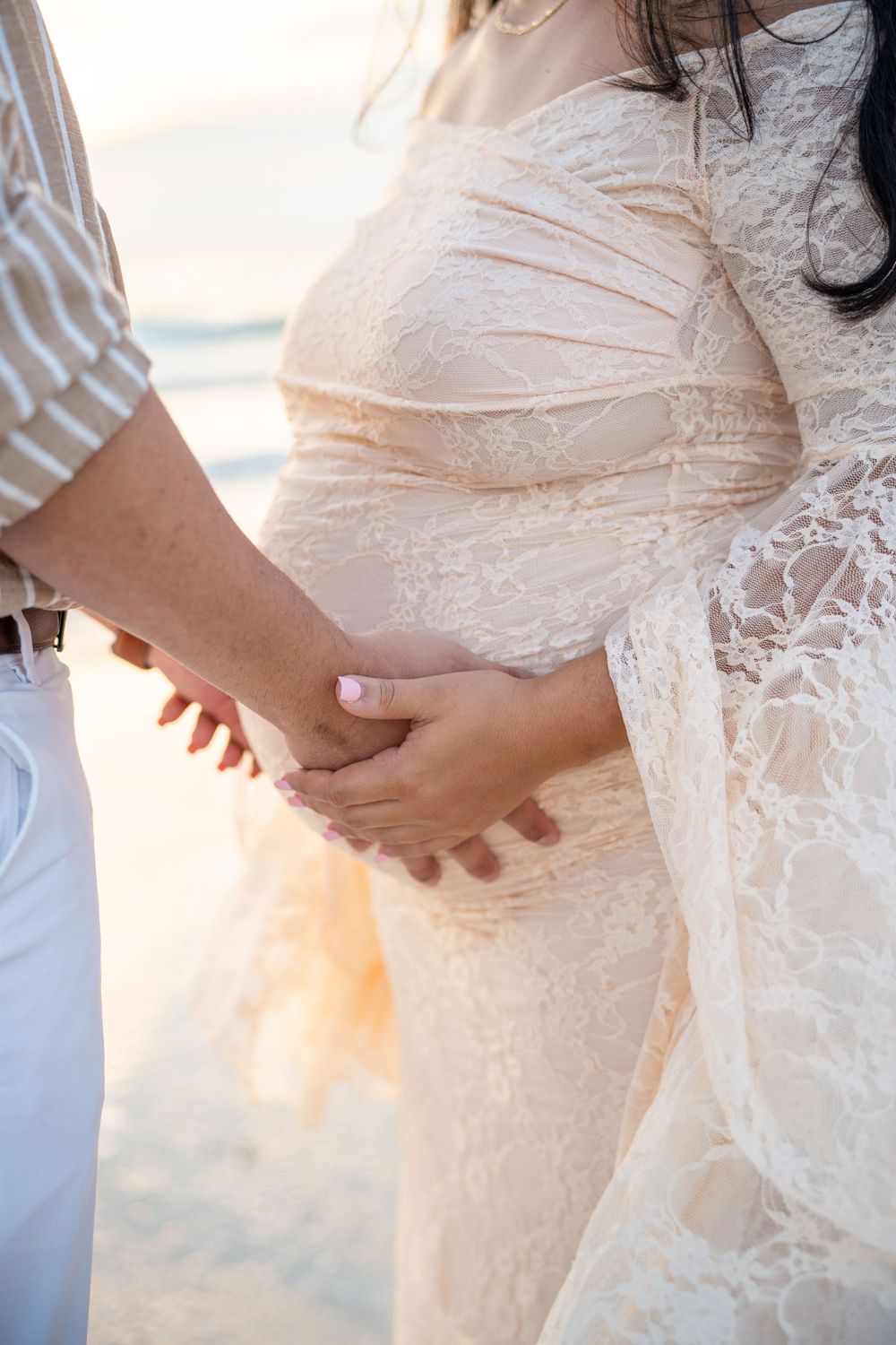 Close-up shots of a lace wedding dress showing delicate details in off-white fabric.