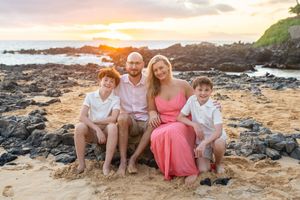 Maui family photographer photo against beautiful Maui sunset beach by ohwowfotos.