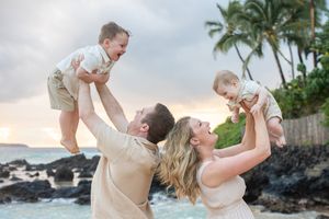 Maui family photographer photo against beautiful Maui sunset beach by ohwowfotos.
