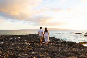 Maui couple engagement photographer photo against beautiful Maui sunset beach by ohwowfotos.