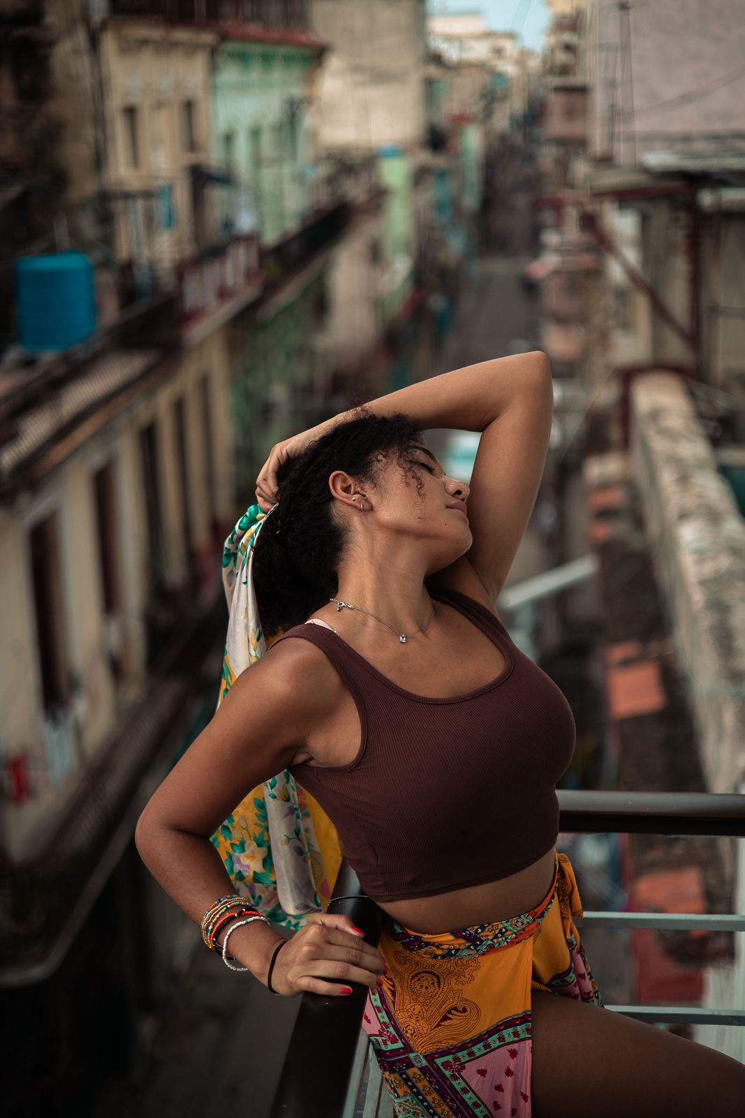 Editorial balcony portrait in Miami, Mannyportraits fashion photography with cinematic tones and South Florida street style