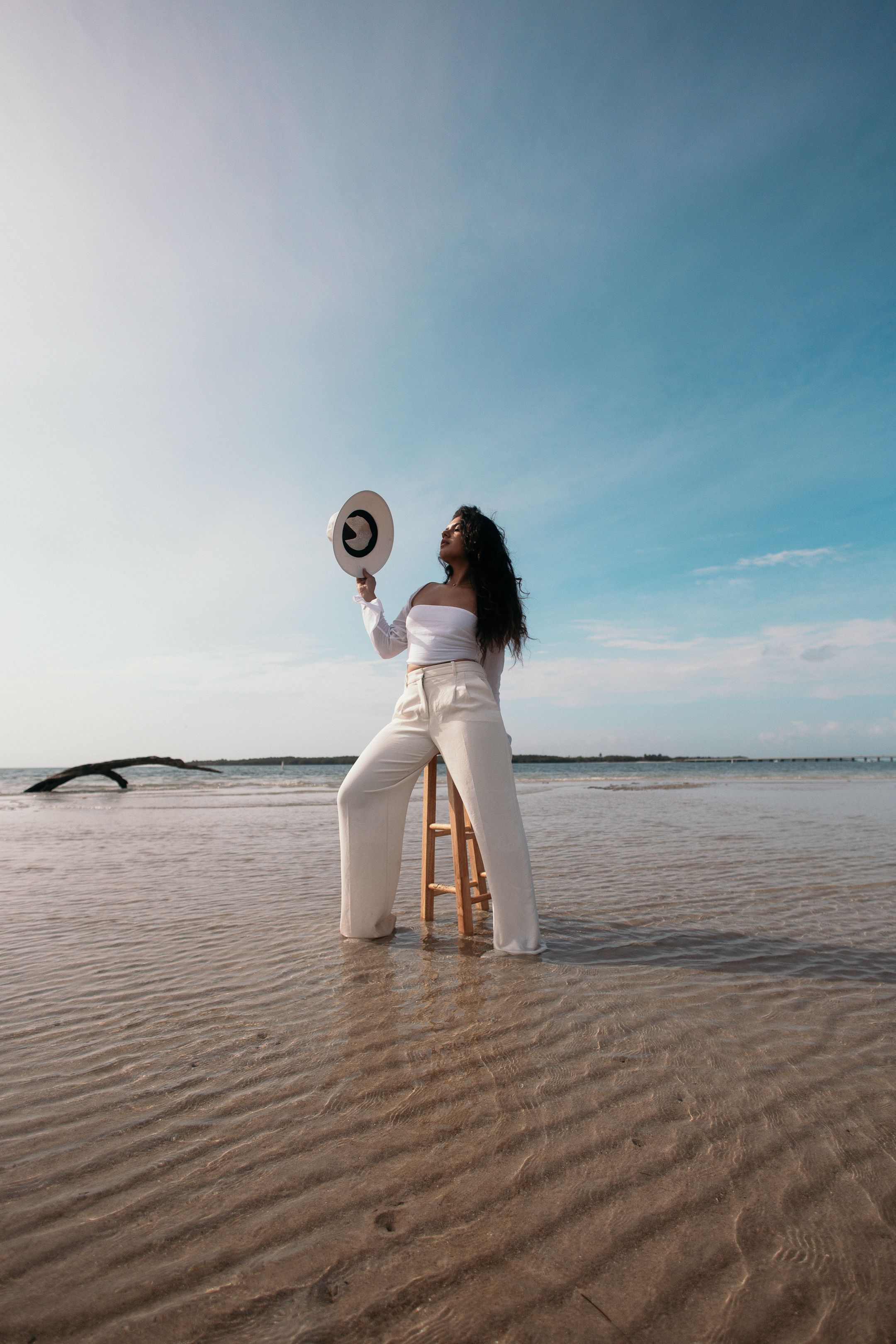 Trending cinematic fashion look, runway-inspired beach editorial styled for high-fashion content by MannyPortraits.