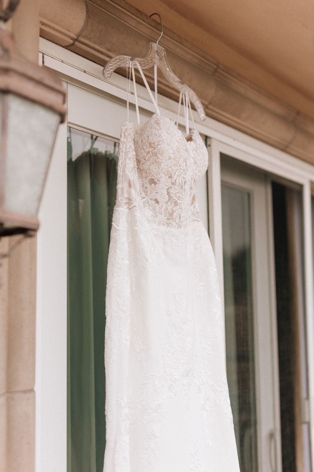 Wedding dress hanging outside a private Malibu coastal residence.